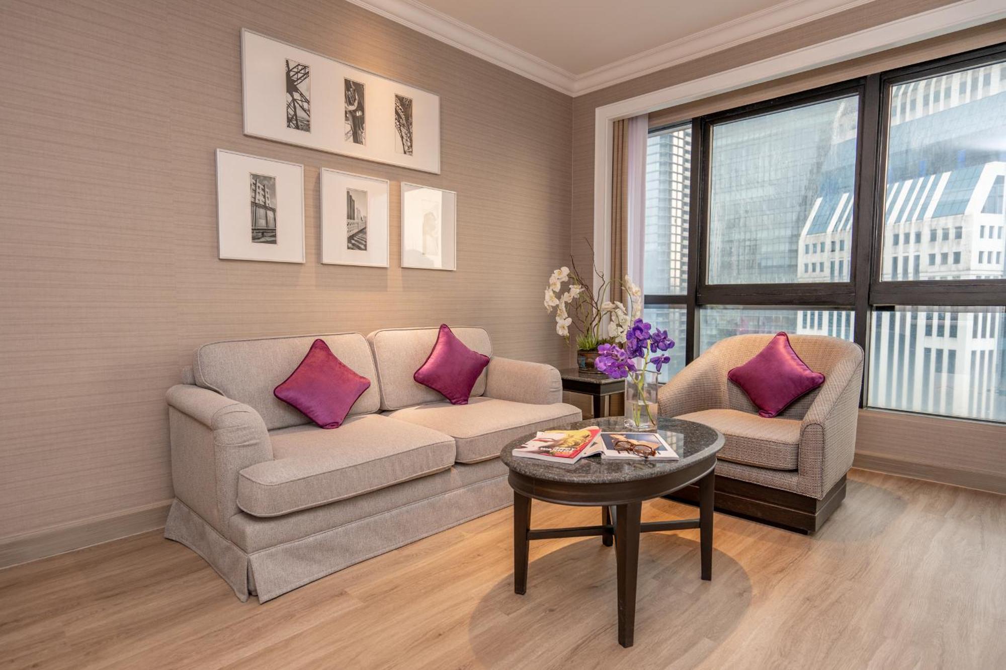 Nh Bangkok Sukhumvit Boulevard Dış mekan fotoğraf A living room in a hotel suite